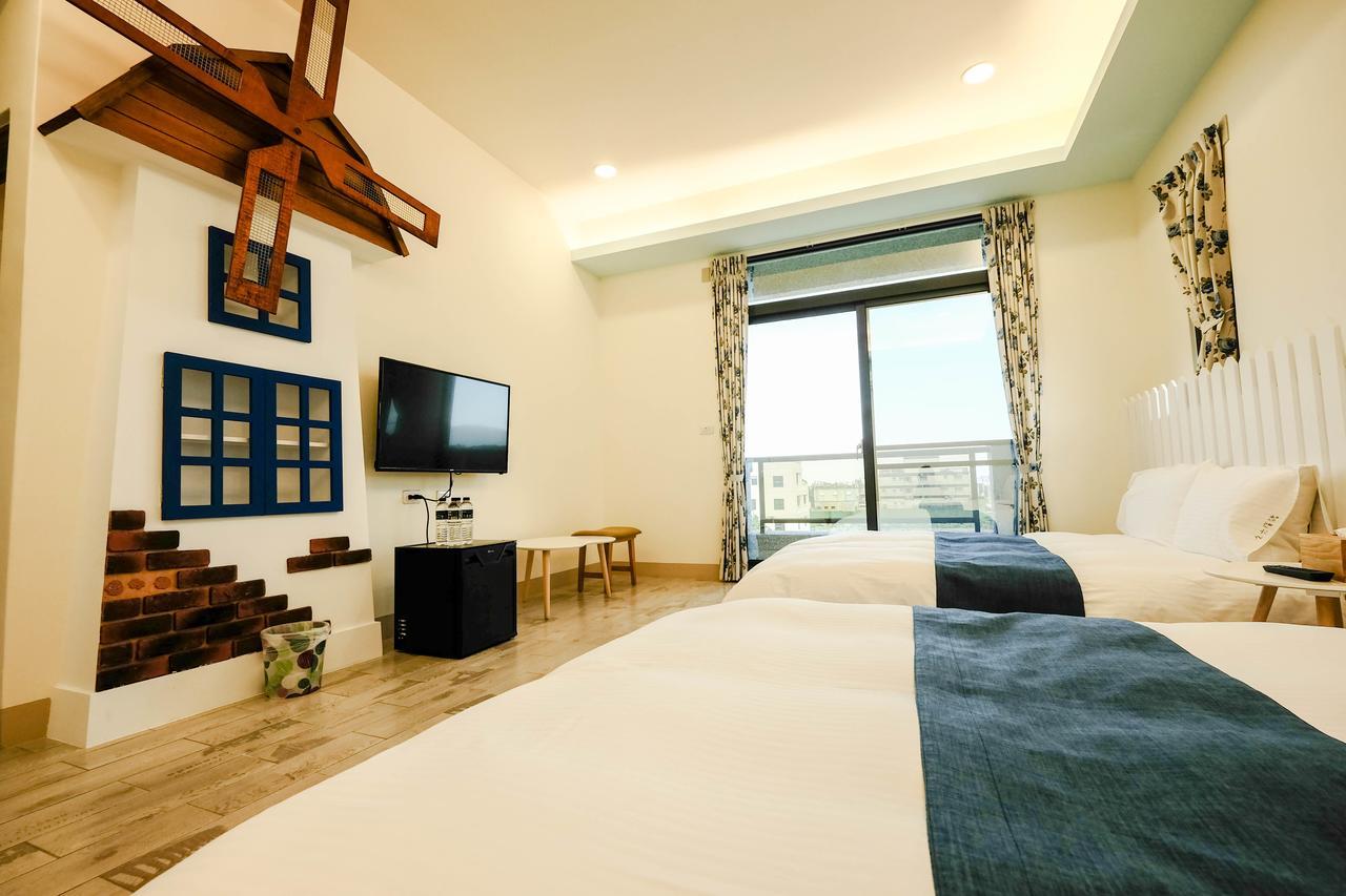 96 Coll Pig Hotel Ji'an Bagian luar foto